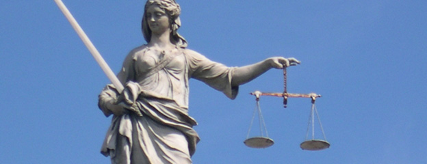 Lady Justice balancing the scales